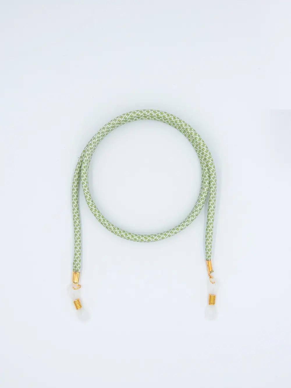Brillenband Paracord mit Diamantmuster in lindgrün und weiss auf weissem Hintergrund