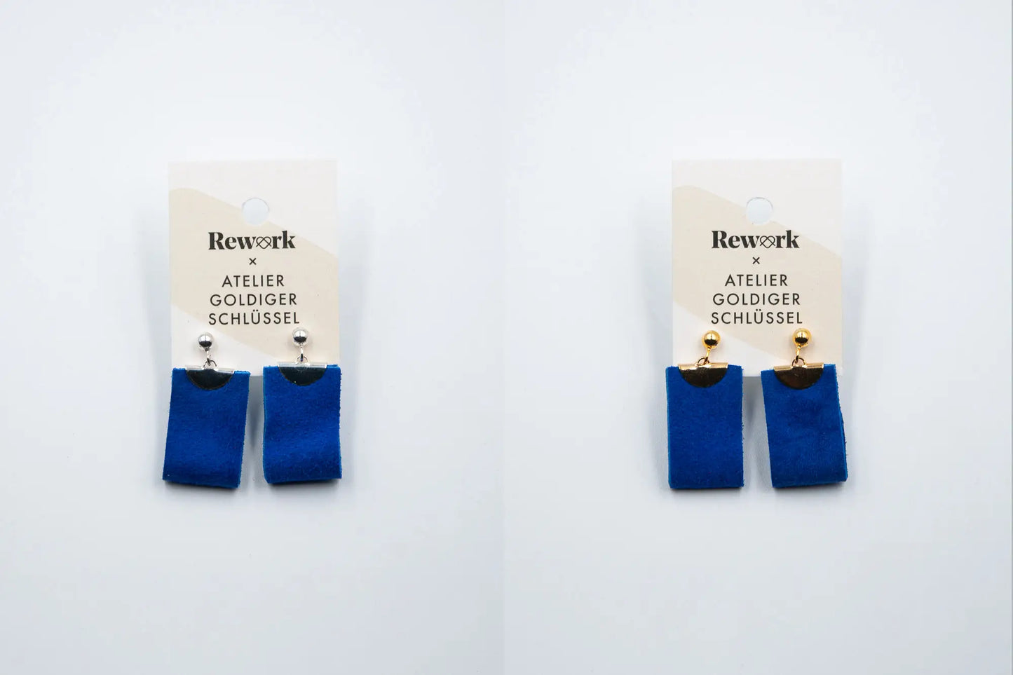 Ohrhänger aus blauem Recycling Leder mit goldenen und silbernen Metallteilen an Etikette auf weissem Hintergund