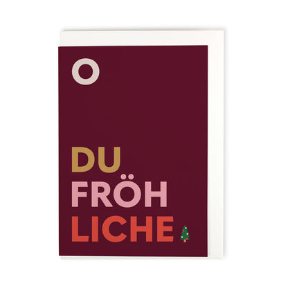 Dunkelrote Postkarte mit dem Schriftzug O du Fröhliche und einem kleinen Tannenbaum